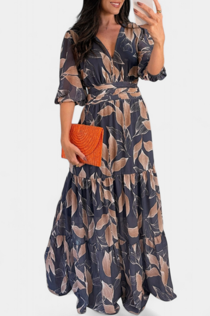 Aísha Vestido Largo Floral con Corte Fluido y Motivo de Hojas